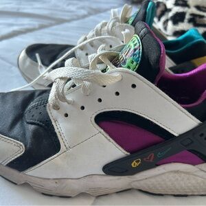 Nike Black and White Athletic Shoes with Purple Accents